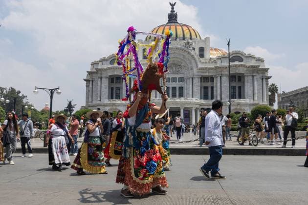 Indigenous Cultures Parade Through Mexico City MEXICO CITY, MEXICO AUGUST 9, 2026: Participants wearing traditional clothing dance and march during the 17th Mega Calenda cultural parade from the Angel of Independence to the Zocalo in Mexico City, August 9, 2026. Organized by the Mexico City government, the event commemorates the International Day of the World s Indigenous Peoples and is part of the 12th Festival of Indigenous Cultures, Indigenous Peoples, and Native Neighborhoods of Mexico City. Mexico City Mexico Copyright: x xCristianxLeyvax xJNAxPressx