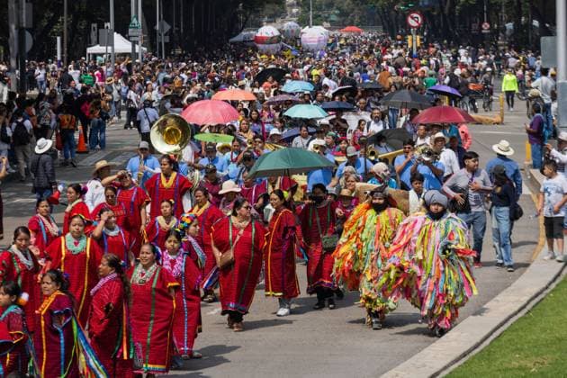 Indigenous Cultures Parade Through Mexico City MEXICO CITY, MEXICO AUGUST 9, 2026: Participants wearing traditional clothing dance and march during the 17th Mega Calenda cultural parade from the Angel of Independence to the Zocalo in Mexico City, August 9, 2026. Organized by the Mexico City government, the event commemorates the International Day of the World s Indigenous Peoples and is part of the 12th Festival of Indigenous Cultures, Indigenous Peoples, and Native Neighborhoods of Mexico City. Mexico City Mexico Copyright: x xCristianxLeyvax xJNAxPressx