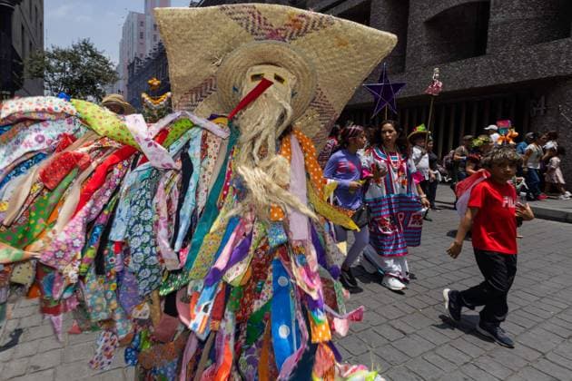 Indigenous Cultures Parade Through Mexico City MEXICO CITY, MEXICO AUGUST 9, 2026: Participants wearing traditional clothing dance and march during the 17th Mega Calenda cultural parade from the Angel of Independence to the Zocalo in Mexico City, August 9, 2026. Organized by the Mexico City government, the event commemorates the International Day of the World s Indigenous Peoples and is part of the 12th Festival of Indigenous Cultures, Indigenous Peoples, and Native Neighborhoods of Mexico City. Mexico City Mexico Copyright: x xCristianxLeyvax xJNAxPressx