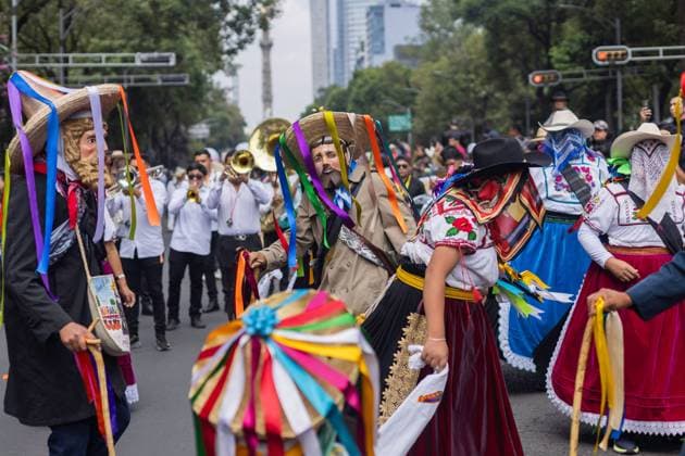 August 9, 2026, Mexico City, Mexico: MEXICO Mexico City, MEXICO Ã¢â‚¬ AUGUST 9, 2026: Participants wearing traditional clothing dance and march during the 17th Mega Calenda cultural parade from the Angel of Independence to the Zocalo in Mexico City, August 9, 2026. Organized by the Mexico City government, the event commemorates the International Day of the World s Indigenous Peoples and is part of the 12th Festival of Indigenous Cultures, Indigenous Peoples, and Native Neighborhoods of Mexico City. Mexico City Mexico - ZUMAq101 20260809_zna_q101_168 Copyright: xCristianxLeyvax