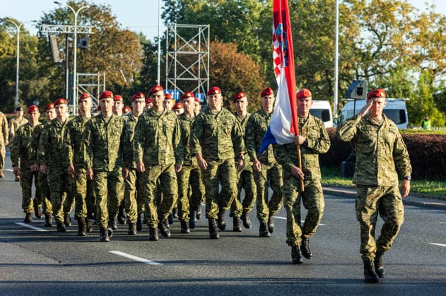 August 9, 2026, Warsaw, Mazovia, Poland: Croatian soldiers march during the parade rehearsal. Early in the morning of 9th August, Poland s armed forces, and those of allies stationed in the country, take part in a rehearsal in preparation for a parade on National Armed Forces Day on the 15th August. Soldiers muster as the sun rises over the Vistula River and march past grandstands prepared for dignitaries. The soldiers were followed by mechanised divisions travelling in tanks and a variety of armoured vehicles. Afterwards, Secretary of State in the Ministry of Defence, Pawel Bejda addresses a post-rehearsal press conference, where he is accompanied by the Chief of the General Staff of the Polish Armed Forces, General Wieslaw Kukula. Warsaw  - ZUMAs197 20260809_aaa_s197_074 Copyright: xNeilxMiltonx