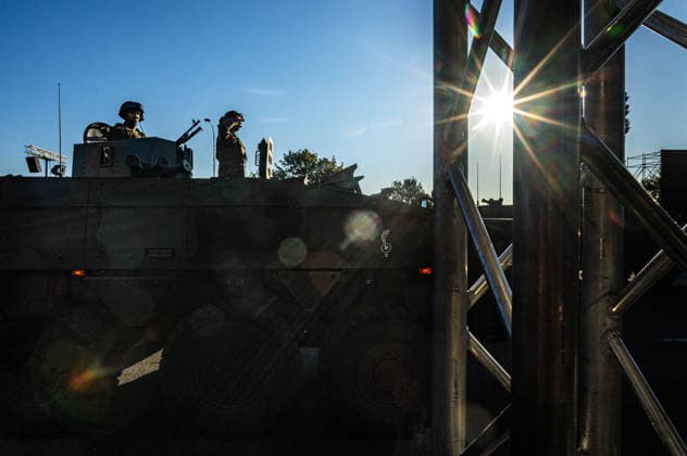 August 9, 2026, Warsaw, Mazovia, Poland: Soldiers atop an armoured vehicle salute during the parade rehearsal. Early in the morning of 9th August, Poland s armed forces, and those of allies stationed in the country, take part in a rehearsal in preparation for a parade on National Armed Forces Day on the 15th August. Soldiers muster as the sun rises over the Vistula River and march past grandstands prepared for dignitaries. The soldiers were followed by mechanised divisions travelling in tanks and a variety of armoured vehicles. Afterwards, Secretary of State in the Ministry of Defence, Pawel Bejda addresses a post-rehearsal press conference, where he is accompanied by the Chief of the General Staff of the Polish Armed Forces, General Wiesla - ZUMAs197 20260809_aaa_s197_081 Copyright: xNeilxMiltonx