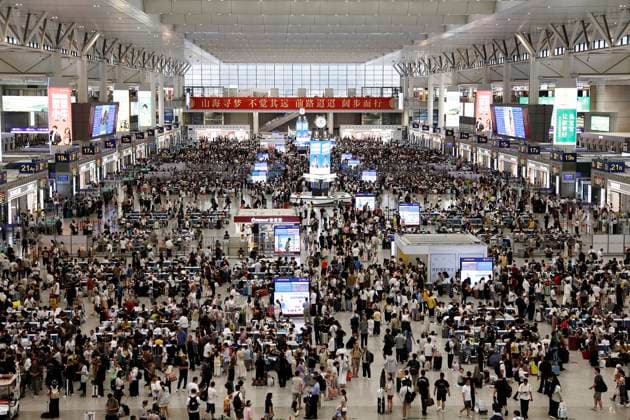 SHANGHAI, CHINA - AUGUST 09: Passengers wait for trains at the waiting hall of Shanghai Hongqiao Railway Station on August 9, 2026 in Shanghai, China. Yangtze River Delta railways have temporarily suspended services on sections of multiple high-speed lines including Shanghai-Kunming, Hangzhou-Wenzhou and Hangzhou-Taizhou from August 9 to 10 due to Typhoon Dolphin.  Copyright: xChinaxNewsxServicex 111658974826