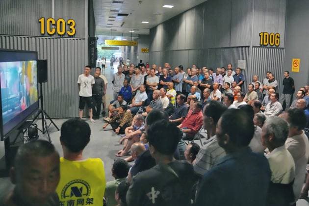 HANGZHOU, CHINA - AUGUST 09: A temporary shelter is set up for workers at Qianjiang Century City on August 9, 2026 in Hangzhou, Zhejiang Province of China. Nearly 10,000 workers were safely evacuated from the area as Typhoon Dolphin approaches.  Copyright: xVCGx 111658991062