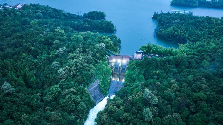 HUZHOU, CHINA - AUGUST 09: The Duihekou Reservoir opens its sluice gates to release floodwaters to brace for Typhoon Dolphin on August 9, 2026 in Deqing County, Huzhou City, Zhejiang Province of China. Typhoon Dolphin, the 13th typhoon of the year, made landfall at Yuhuan of Taizhou City, east China s Zhejiang Province, at around 5:30 p.m. on August 9.  Copyright: xVCGx 111658995581