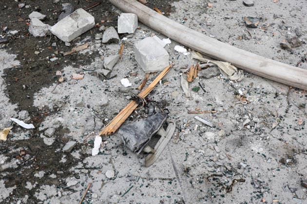 An ice skate lies on the ground outside a 10-storey apartment block in the Saltivskyi district hit by a Russian S8000 Banderol cruise missile, Kharkiv, Ukraine, August 9, 2026. As a result of the terrorist attack, the seventh to tenth floors were destroyed. At present, three people are confirmed dead and 37 others injured. (Photo by Viacheslav Madiievskyi Ukrinform) Russian Banderol missile strikes apartment block in Kharkiv  Copyright: xViacheslavxMadiievskyix