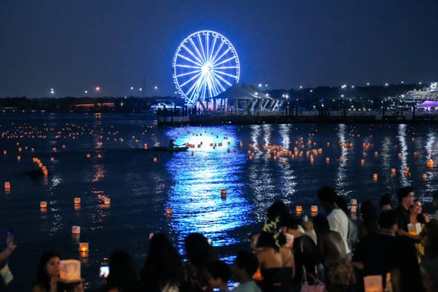 Water Lantern Festival lights up Maryland’s National Harbor in U.S. NATIONAL HARBOR, MARYLAND, UNITED STATES - AUGUST 9: People attend the Washington D.C. Water Lantern Festival at National Harbor SouthPointe in Maryland, United States, on August 9, 2026. Participants release lanterns bearing messages of memories and wishes onto the water along the Potomac River. Hasan Akbas Anadolu National harbor United States. Editorial use only. Please get in touch for any other usage.  Copyright: x2026xAnadoluxHasanxAkbasx