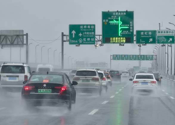 SHANGHAI, CHINA - AUGUST 10: Vehicles are congested on elevated roads due to Typhoon Dolphin on August 10, 2026 in Shanghai, China. Typhoon Dolphin brought heavy rain and strong winds to the city, causing traffic disruptions.  Copyright: xVCGx 111659110583