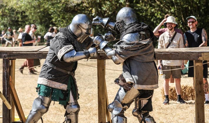 Kingdom of Loxwood medieval festival 09.08.2026. Members of the Full contact medieval armoured combat group Invicta take part in mass combat at the Kingdom of Loxwood medieval festival in west Sussex  Copyright: xRichardxPohlex NINTCHDBPICT001100253863