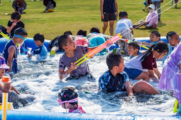GUIYANG, CHINA - AUGUST 09: Citizens and tourists splash water on each other during the Summer Wonderland Ethnic Group Celebration at Guanshanhu Park on August 9, 2026 in Guiyang, Guizhou Province of China. The event features water splashing activities allowing participants to cool off during the summer heat.  Copyright: xVCGx 111659117654