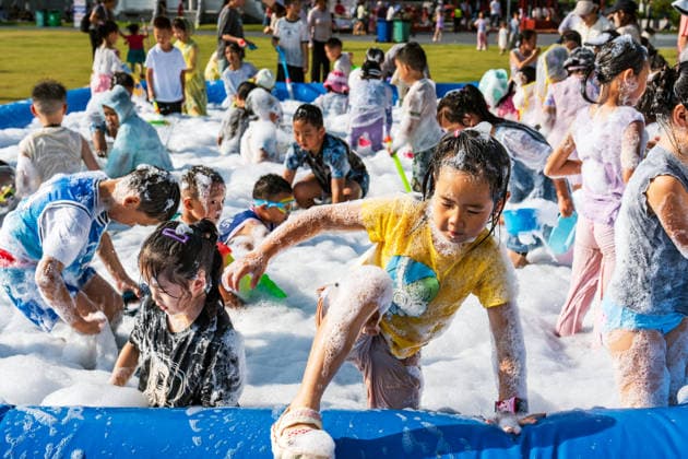 GUIYANG, CHINA - AUGUST 09: Citizens and tourists splash water on each other during the Summer Wonderland Ethnic Group Celebration at Guanshanhu Park on August 9, 2026 in Guiyang, Guizhou Province of China. The event features water splashing activities allowing participants to cool off during the summer heat.  Copyright: xVCGx 111659117648