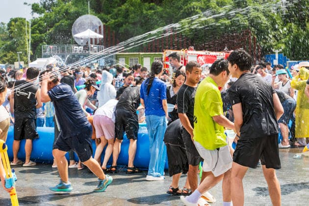 GUIYANG, CHINA - AUGUST 09: Citizens and tourists splash water on each other during the Summer Wonderland Ethnic Group Celebration at Guanshanhu Park on August 9, 2026 in Guiyang, Guizhou Province of China. The event features water splashing activities allowing participants to cool off during the summer heat.  Copyright: xVCGx 111659117629