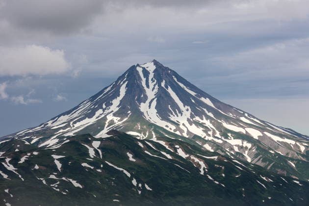 RUSSIA, KAMCHATKA REGION - AUGUST 10, 2026: A view of the Vilyuchinsky volcano in the south of the Kamchatka Peninsula. Valeria Kosilova TASS  95989500