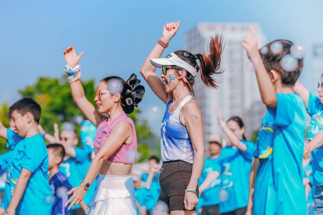 SHENZHEN, CHINA - AUGUST 08: Participants take part in the Run, Teenagers 2026 Longgang District National Fitness Day themed event at Shenzhen Universiade Sports Centre on August 8, 2026 in Longgang District, Shenzhen City, Guangdong Province of China. The event marks the 18th National Fitness Day, featuring a morning run followed by water gun battles and a music party to promote public fitness.  Copyright: xVCGx 111659151925