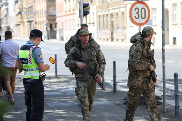 Zagreb, Croatia,100826 Filming of a movie about the war in Ukraine, directed by Doug Liman, outside the famous Hotel Esplanade in Zagreb, featuring Hollywood stars Sean Penn and Adrien Brody. Pictured: actors portraying Ukrainian soldiers. Photo: Ranko Suvar CROPIX Zagreb Croatia Copyright: xxRankoxSuvarx esplanade_film13-100826