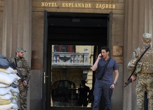 Zagreb, Croatia,100826 Filming of a movie about the war in Ukraine, directed by Doug Liman, outside the famous Hotel Esplanade in Zagreb, featuring Hollywood stars Sean Penn and Adrien Brody. Pictured: Adrien Brody. Photo: Ranko Suvar CROPIX Zagreb Croatia Copyright: xxRankoxSuvarx esplanade_film30a-100826