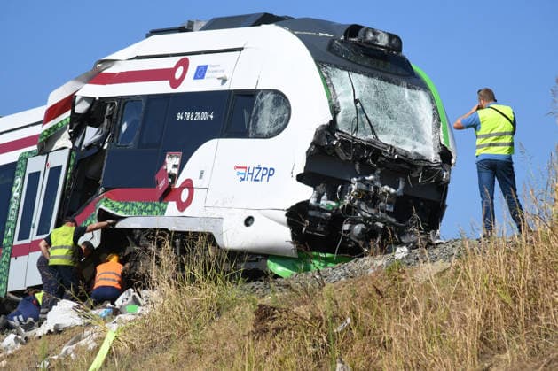 260810_PXL_train accident Two days after the accident, the electric train is still standing at the same place of the collision, in Skrinjari, Croatia, on August 10. 2026. Employees of Croatian Railwayss, assisted by employees of the KonÄar company - electric vehicles, are making every effort to lift the electric train and create conditions for it to be towed. It is not yet known when the conditions will be created. On Saturday there was a serious train accident on the Zagreb - Bjelovar line (Sv. Ivan Zabno - Gradec) when a passenger and freight train collided head-on, and tonight the clearing of the accident site began. Croatian Railwayss employees began removing the freight train wagons at midnight, and today, shortly before noon, the mom  DamirxSpehar PIXSELL