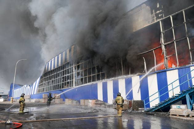RUSSIA, DONETSK PEOPLE S REPUBLIC - AUGUST 10, 2026: Emergency workers battle a fire caused by a Ukrainian drone strike on the Galaktika Galaxy shopping centre in Makeyevka, east of Donetsk. Dmitry Yagodkin TASS  95999069