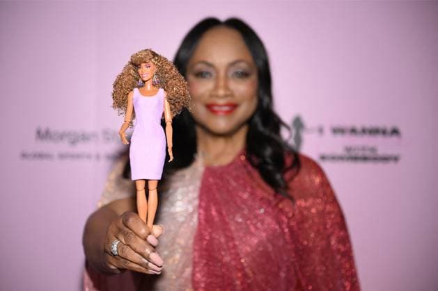 Whitney Houston Barbie doll unveiled by her sister-in-law and former manager Pat Houston at the Fifth Legacy of Love Gala in Atlanta on August 8 The first-ever Whitney Houston Barbie doll was unveiled by her sister-in-law and former manager Pat Houston, who revealed it was 20 years in the making., , Pat, who is also executor of the late singer’s estate, unveiled the doll at the Fifth Legacy of Love Gala, an annual event hosted by the Whitney E. Houston Legacy Foundation, in Atlanta on Saturday (AUGUST 8)., , The Barbie Signature Whitney Houston Doll recreates Whitney’s look in the 1987 music video for her huge hit I Wanna Dance with Somebody (Who Loves Me) ., , Pat worked closely with the Barbie design team to help shape the doll’s look, f  Copyright: xThexMegaxAgencyxDerekxWhitexforxMattelxInc Megax