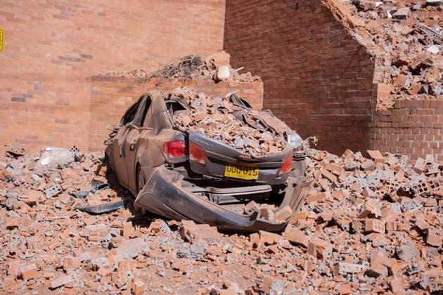 (260810) -- CALI, Aug. 10, 2026 -- Photo taken on Aug. 10, 2026 shows a damaged car after an earthquake in Cali, Colombia. Colombia declared a state of national disaster on Monday after a magnitude 7.4 earthquake uck the country s west earlier in the day and killed more than 70 people nationwide. ( Xinhua) COLOMBIA-CALI-EARTHQUAKE-AFTERMATH STR 