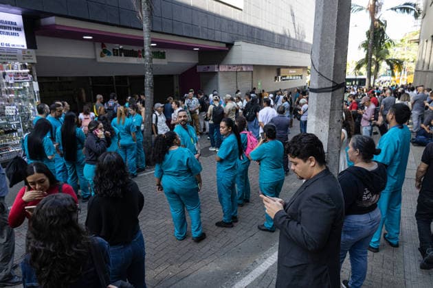 August 10, 2026, Medellin, Antioquia, Colombia: People gather outside buildings and streets in medellin after a 7,4 Earthquake that struck Colombia on August 10, 2026. Medellin Colombia  - ZUMAvp1_ 20260810_zia_vp1_023 Copyright: xJuanxJosexPatinox