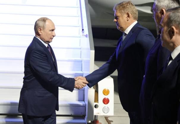 Russia Putin Siberian Federal District 9220389 11.08.2026 Russian President Vladimir Putin is welcomed by Presidential Envoy to the Siberian Federal District Anatoly Seryshev upon arrival at Tolmachevo International Airport outside Novosibirsk, Russia. Sputnik Novosibirsk Russia  Copyright: xx
