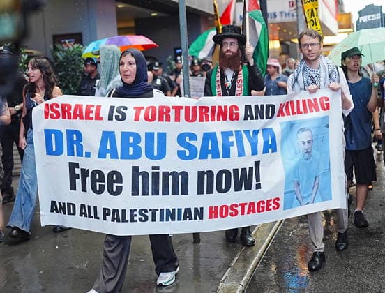 Rally for Anas Al-Sharif and the journalists of Gaza in New York NEW YORK, UNITED STATES - AUGUST 10: Protesters holding banners and Palestinian flags march to Times Square after picketing The New York Times to demand justice for Palestinian journalist Anas Al-Sharif and all journalists killed in Gaza by Israel, on August 10, 2026, in New York City, United States. Selcuk Acar Anadolu New York United States. Editorial use only. Please get in touch for any other usage.  Copyright: x2026xAnadoluxSelcukxAcarx