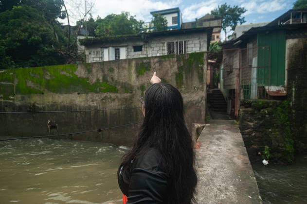 August 11, 2026, Quezon City, Quezon, Philippines: Evacuees in the residential areas of Quezon CIty, located near the currently overflowing La Mesa Dam seek shelter in a nearby school as flood and mud sweep through their streets and houses. Quezon City Philippines - ZUMAy102 20260811_zip_y102_005 Copyright: xKenosisxYapx