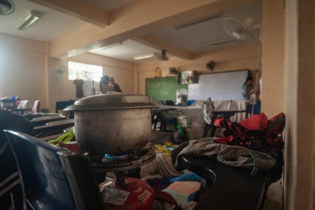 August 11, 2026, Quezon City, Quezon, Philippines: Evacuees in the residential areas of Quezon CIty, located near the currently overflowing La Mesa Dam seek shelter in a nearby school as flood and mud sweep through their streets and houses. Quezon City Philippines - ZUMAy102 20260811_zip_y102_008 Copyright: xKenosisxYapx