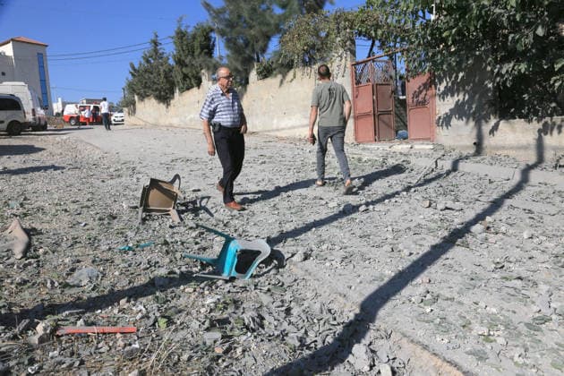 Israeli army demolishes a Palestinian home in Nablus, Palestine - 11 Aug 2026 Palestinians seen walking through a devastated street after the Israeli army demolished a house with explosives. Israeli army demolished the home of a Palestinian accused of carrying out an armed attack that killed an Israeli soldier and a Jewish settler in the village of Tell. Nablus Palestine Copyright: xNasserxishatyehx xSOPAxImagesx Nishtayeh41
