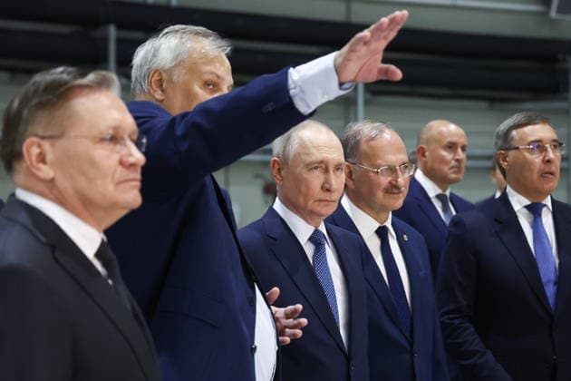 RUSSIA, NOVOSIBIRSK - AUGUST 11, 2026: Russia s President Vladimir Putin (C) visits Shared Research Facility of the Siberian Ring Source of Photons (SKIF). Pictured L-R: Alexei Likhachev, Director General of the Rosatom State Atomic Energy Corporation, Pavel Logachev, Director of Budker Institute of Nuclear Physics of the Siberian Branch of the Russian Academy of Sciences, Valery Bukhtiyarov, Director of Boreskov Institute of Catalysis of the Siberian Branch of the Russian Academy of Sciences; pictured R: Russia s Science and Higher Education Minister Valery Falkov. Sergei Fadeichev TASS  96019348