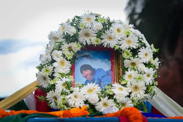 August 11, 2026, Kathmandu, Bagmati, Nepal: A photograph of Nepali mountaineer Kilu Pemba Sherpa is displayed with a garland as the remains of the three climbers are brought to Tribhuvan International Airport in Kathmandu, Nepal, on August 11, 2026, after being repatriated from Pakistan following the Broad Peak avalanche tragedy. Kilu Pemba Sherpa was among 10 members of an international expedition killed in an avalanche while ascending toward Camp 3 on Broad Peak (8,047 m) in PakistanÃ¢â‚¬â ¢s Karakoram Range. The tragedy also claimed the lives of renowned British-Nepali mountaineer Nirmal Ã¢â‚¬oeNimsÃ¢â‚¬Â Purja, Pur Bahadur Gurung (Yukta), Nima Sherpa, Nawang Thindu Sherpa, Gyalu Sherpa, Wang Zhong of China, Nadhira Ahmed Abdullah Al Ha - ZUMAs330 20260811_zsp_s330_017 Copyright: xSafalxPrakashxShresthax