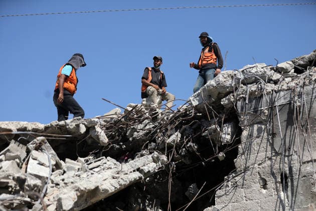 Civil Defense Teams Recover Bodies From Gaza City Rubble Palestinian Civil Defense members, in cooperation with the International Committee of the Red Cross (ICRC), work with limited resources to recover bodies from beneath the rubble of a home belonging to the Gharbiya family in western Gaza City, Gaza Strip, on August 11, 2026. Medics say 13 bodies remain trapped under the rubble, as search and recovery operations continue amid a severe shortage of heavy equipment needed to clear debris and reach the victims. Photo by Bilal Osama apaimages Gaza city Gaza Strip Palestinian Territory 110826_Gaza_BO_01(8) Copyright: xapaimagesxBilalxOsamax xapaimagesx