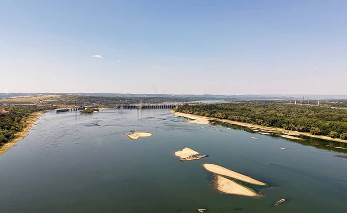 World War II-German warships emerge from Danube amid low water levels in Serbia PRAHOVO, SERBIA - AUGUST 11: Sunken hulls of World War II-era Nazi warships lie exposed in the Danube River near Prahovo, Serbia on August 11, 2026. Extreme heat and severe drought across Europe have caused water levels in the river to drop to historic lows, revealing dozens of scuttled German vessels laden with explosives from 1944. According to some estimates, around 200 World War II shipwrecks lie on the sandy bed of the Danube. Sasa Djordjevic Anadolu Prahovo Serbia. Editorial use only. Please get in touch for any other usage.  Copyright: x2026xAnadoluxSasaxDjordjevicx