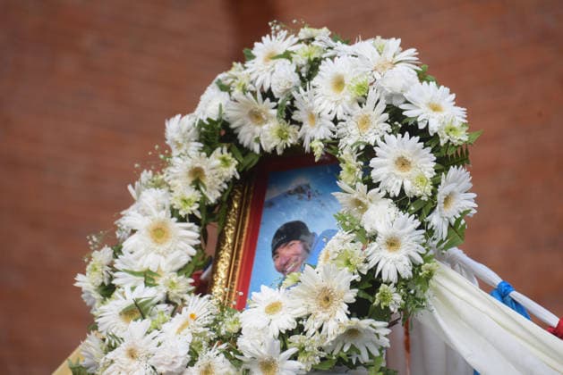 August 11, 2026, Kathmandu, Bagmati, Nepal: A photograph of Nepali mountaineer Kilu Pemba Sherpa is displayed with a garland as the remains of the three climbers are brought to Tribhuvan International Airport in Kathmandu, Nepal, on August 11, 2026, after being repatriated from Pakistan following the Broad Peak avalanche tragedy. Kilu Pemba Sherpa was among 10 members of an international expedition killed in an avalanche while ascending toward Camp 3 on Broad Peak (8,047 m) in PakistanÃ¢â‚¬â ¢s Karakoram Range. The tragedy also claimed the lives of renowned British-Nepali mountaineer Nirmal Ã¢â‚¬oeNimsÃ¢â‚¬Â Purja, Pur Bahadur Gurung (Yukta), Nima Sherpa, Nawang Thindu Sherpa, Gyalu Sherpa, Wang Zhong of China, Nadhira Ahmed Abdullah Al Ha - ZUMAs330 20260811_zsp_s330_022 Copyright: xSafalxPrakashxShresthax