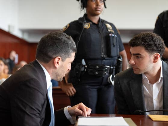 Luigi Mangione talks to one of his lawyers in Manhattan Supreme Court Tuesday, August 11, 2026 in Manhattan, New York. Mangione is on trial for the 2024 killing of UnitedHealthcare CEO Brian Thompson. Pool  NYX20260811208 BARRYxWILLIAMS