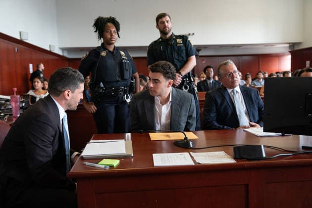 Luigi Mangione talks to one of his lawyers in Manhattan Supreme Court Tuesday, August 11, 2026 in Manhattan, New York. Mangione is on trial for the 2024 killing of UnitedHealthcare CEO Brian Thompson. Pool  NYX20260811212 BARRYxWILLIAMS