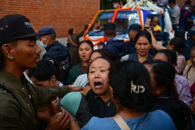 August 11, 2026, Kathmandu, Nepal: KATHMANDU, NEPAL Ã¢â‚¬ AUGUST 11, 2026: Relatives mourn at Tribhuvan International Airport as the remains of Nepali mountaineers Kilu Pemba Sherpa, Nima Sherpa and Gyalu Sherpa arrive in Kathmandu after being repatriated from Pakistan following the Broad Peak avalanche tragedy. The three climbers were among 10 members of an international expedition killed by an avalanche while ascending toward Camp 3 on Broad Peak, an 8,047-meter mountain in Pakistan s Karakoram Range. The tragedy also claimed the lives of renowned British-Nepali mountaineer Nirmal Nims Purja and climbers from China, Oman, the United States and Pakistan. Kathmandu Nepal  - ZUMAq101 20260811_zna_q101_095 Copyright: xSafalxPrakashxShresthax