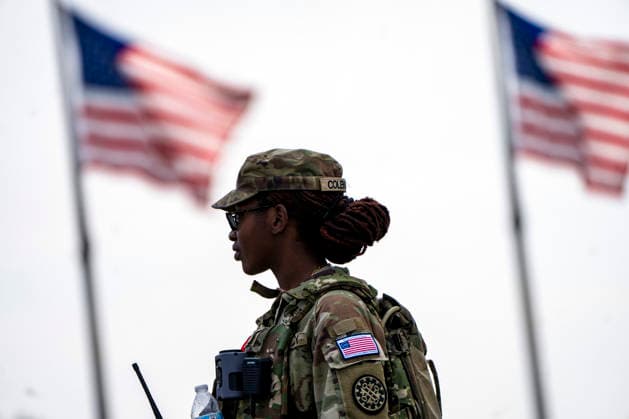 Members of the National Guard patrol near the Washington Monument in Washington, DC on Tuesday, August 11, 2026. Today marks the one year anniversary the National Guard troops, more than 4,600 at present, have patrolled the streets of Washington, DC, after President Donald Trump deployed them in August 2025.  WAP2026081126356 BONNIExCASH
