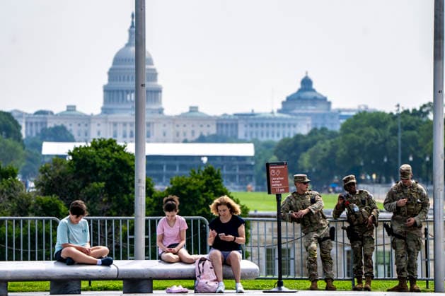 Members of the National Guard patrol near the Washington Monument in Washington, DC on Tuesday, August 11, 2026. Today marks the one year anniversary the National Guard troops, more than 4,600 at present, have patrolled the streets of Washington, DC, after President Donald Trump deployed them in August 2025.  WAP2026081126357 BONNIExCASH