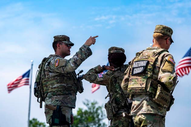 Members of the National Guard patrol near the Washington Monument in Washington, DC on Tuesday, August 11, 2026. Today marks the one year anniversary the National Guard troops, more than 4,600 at present, have patrolled the streets of Washington, DC, after President Donald Trump deployed them in August 2025.  WAP2026081126363 BONNIExCASH