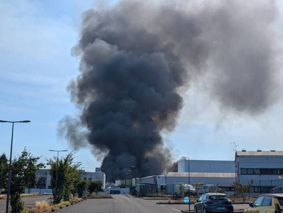 Major fire broke near Roissy-CDG Airport in Paris PARIS, FRANCE - AUGUST 11: A view of smoke after a fire broke in Louvres, near Roissy-CDG Airport, north of Paris, France on August 11, 2026. The fire led to the temporary closure of two of the airport’s runways. Rail and road traffic was partially disrupted. In total, nearly 110 firefighters were deployed and, according to initial reports, at least several dozen vehicles were destroyed by the flames. Luc Auffret Anadolu Paris France. Editorial use only. Please get in touch for any other usage.  Copyright: x2026xAnadoluxLucxAuffretx