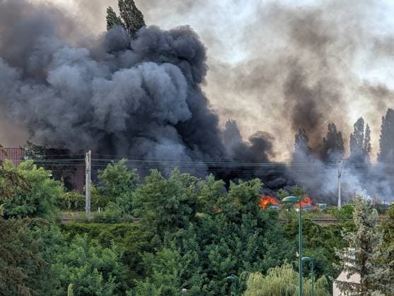 Major fire broke near Roissy-CDG Airport in Paris PARIS, FRANCE - AUGUST 11: A view of smoke after a fire broke in Louvres, near Roissy-CDG Airport, north of Paris, France on August 11, 2026. The fire led to the temporary closure of two of the airport’s runways. Rail and road traffic was partially disrupted. In total, nearly 110 firefighters were deployed and, according to initial reports, at least several dozen vehicles were destroyed by the flames. Luc Auffret Anadolu Paris France. Editorial use only. Please get in touch for any other usage.  Copyright: x2026xAnadoluxLucxAuffretx