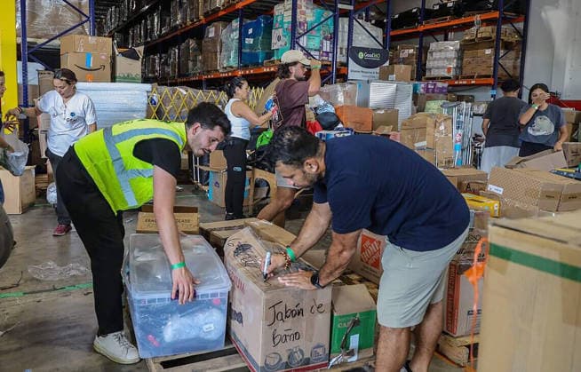 August 11, 2026, Fl, USA: Volunteers filled boxes with supplies of aid for the victims in Colombia, as a press conference held by Michael Capponi, founder of the Global Empowerment Mission (GEM), was taking place to detail the urgent relief operations and a call for local volunteers and the need of donations a day after the devastating 7.4-magnitude earthquake that struck western Colombia on Aug. 10, at the organizationÃ¢â‚¬â ¢s headquarters in Doral, Florida, on Tuesday, Aug. 11, 2026. USA  - ZUMAm67_ 20260811_zaf_m67_002 Copyright: xPedroxPortalx