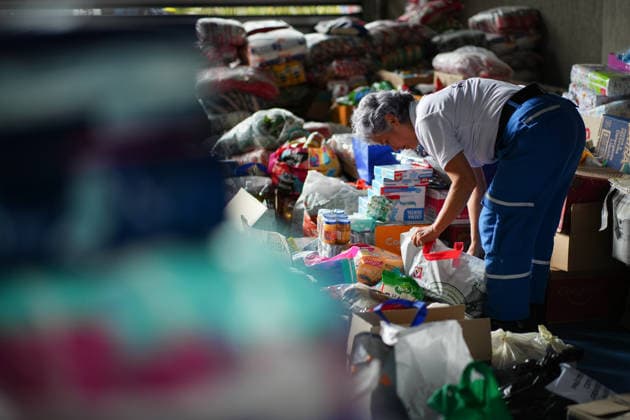 Colombians deliver donations for earthquake victims in Bogota BOGOTA, COLOMBIA – AUGUST 11, 2026: A Colombian Red Cross official sorts humanitarian donations at a collection center in Bogota, Colombia, on August 11, 2026. The donations will be sent to communities affected by the earthquake that struck Colombia on August 10, causing damage and affecting several cities across the country. Andres Acero Anadolu Bogota Colombia. Editorial use only. Please get in touch for any other usage.  Copyright: x2026xAnadoluxAndresxAcerox