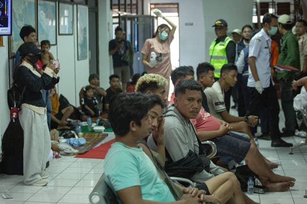 August 12, 2026, Karangasem, Bali, Indonesia: Passengers of the ferry KMP Putri Yasmin await data collection and medical examinations at the ASDP Emergency Post in Padangbai Port, Karangasem, Bali. ...A navy vessel and surrounding ships rushed to rescue 131 people onboard (114 passengers and 17 crew members) after the inter-island ferry caught fire in the Sekotong waters of the Lombok Strait at around 4:15 AM local time during its voyage to Lembar, Lombok. Authorities confirmed 35 survivors were evacuated back to Padangbai, while the remaining were transported to Lombok. One casualty was reported in the incident. Karangasem Indonesia - ZUMAp229 20260812_zip_p229_007 Copyright: xLanaxPriatnax