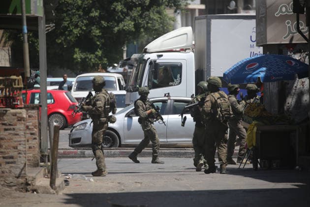 Israeli Forces Raid Balata Refugee Camp Near Nablus Israeli forces deploy during a military operation in Balata refugee camp, east of the West Bank city of Nablus, on August 12, 2026. Israeli forces also raid the camp’s central market during the operation. Photo by Mohammed Nasser apaimages Nablus West Bank Palestinian Territory 120826_Nablus_MN_00(11) Copyright: xapaimagesxMohammedxNasserx xapaimagesx