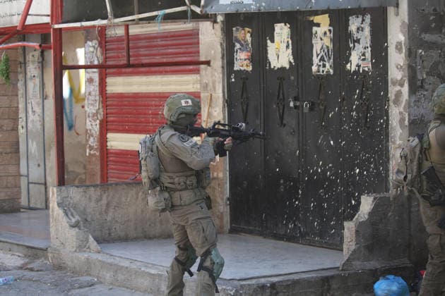 Israeli Forces Raid Balata Refugee Camp Near Nablus Israeli forces deploy during a military operation in Balata refugee camp, east of the West Bank city of Nablus, on August 12, 2026. Israeli forces also raid the camp’s central market during the operation. Photo by Mohammed Nasser apaimages Nablus West Bank Palestinian Territory 120826_Nablus_MN_00(7) Copyright: xapaimagesxMohammedxNasserx xapaimagesx