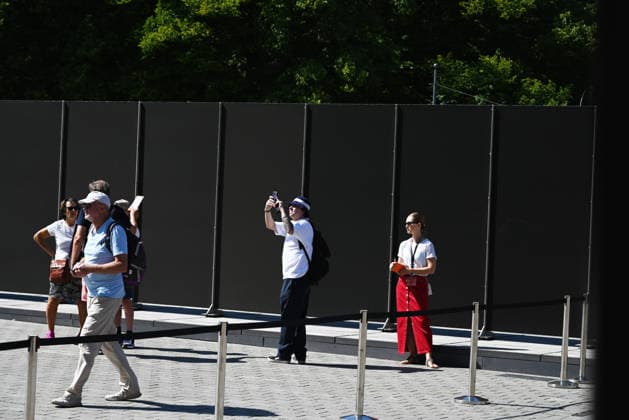65th Anniversary of the Berlin Wall in Berlin BERLIN, GERMANY – AUGUST 12: People visit the opening ceremony of a 30-meter-long temporary memorial installation and the open-air exhibition Views of the Wall: Berlin 1961–1990, marking the 65th anniversary of the construction of the Berlin Wall, near the Brandenburg Gate in Berlin, Germany, on August 12, 2026. Volodymyr Sindieiev Anadolu Berlin Germany. Editorial use only. Please get in touch for any other usage.  Copyright: x2026xAnadoluxVolodymyrxSindieievx