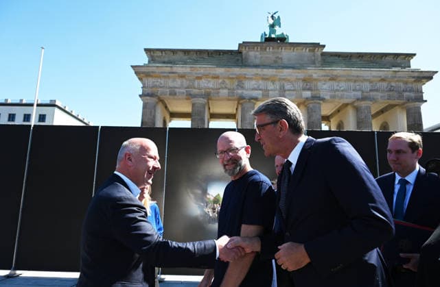 65th Anniversary of the Berlin Wall in Berlin BERLIN, GERMANY – AUGUST 12: Berlin’s Governing Mayor Kai Wegner and Federal Commissioner for Culture and the Media Wolfram Weimer attend the opening ceremony of a 30-meter-long temporary memorial installation and the open-air exhibition Views of the Wall: Berlin 1961–1990, marking the 65th anniversary of the construction of the Berlin Wall, near the Brandenburg Gate in Berlin, Germany, on August 12, 2026. Volodymyr Sindieiev Anadolu Berlin Germany. Editorial use only. Please get in touch for any other usage.  Copyright: x2026xAnadoluxVolodymyrxSindieievx